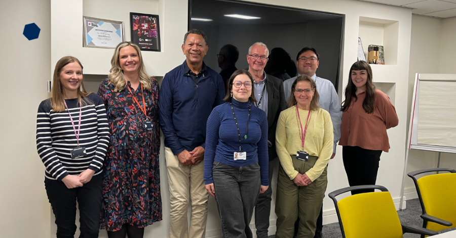 Group photo of some Team Green members taken at the in-person meeting in April