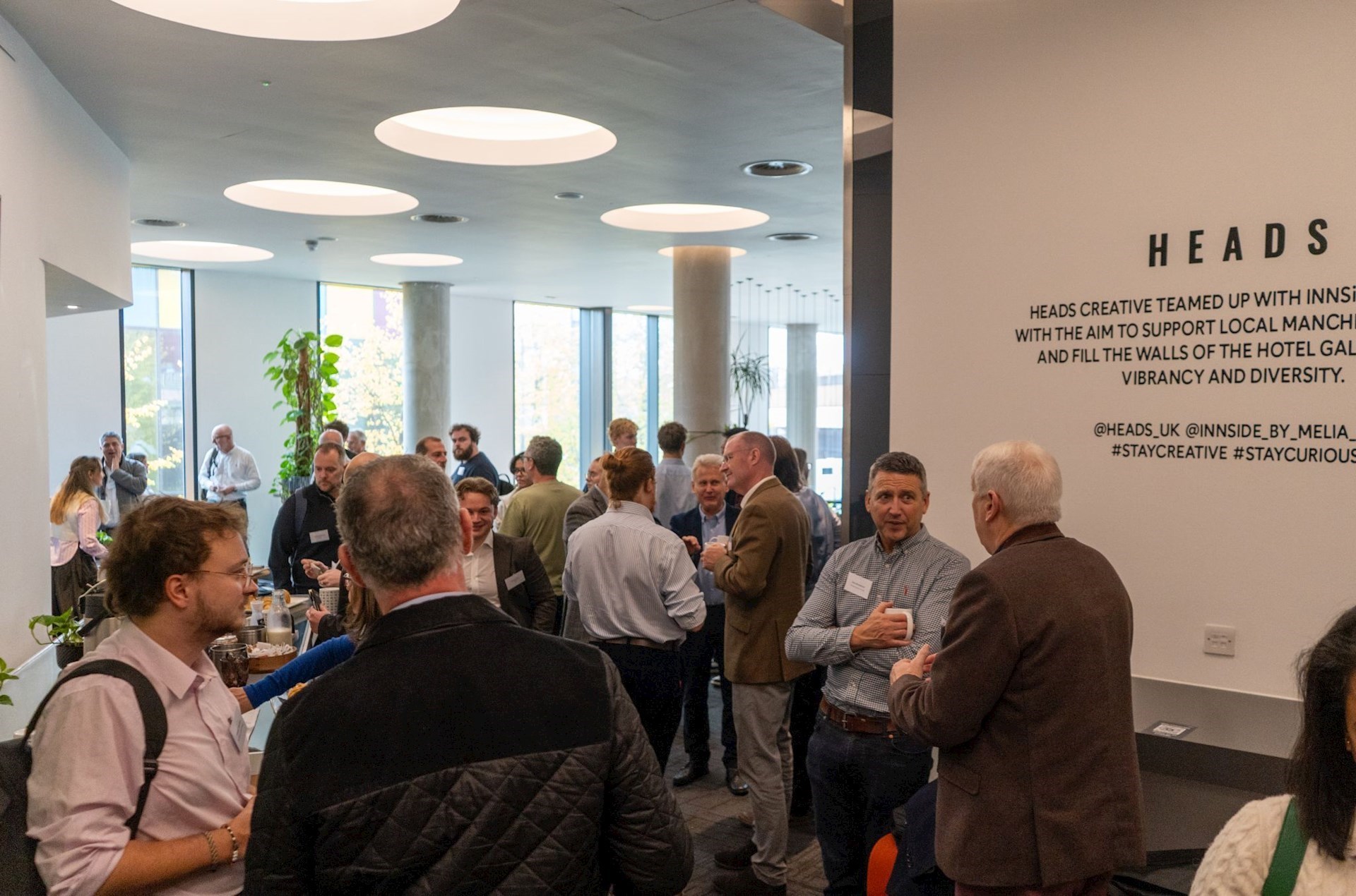 Groups of people networking at an Energy Innovation Agency event