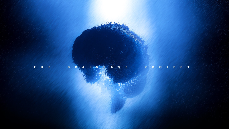 Dark blue pixelated image of a brain on blue background, white text in the centre of the image reads: "The Brainrave Project"