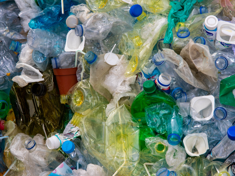 Image of plastic waste, such as plastic bottles and bags